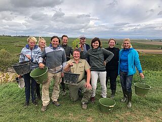 Gruppenfoto von Erntearbeitern