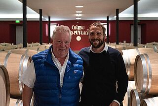 Heiner und Luca Lobenberg im Weinkeller Grand Puy Lacoste